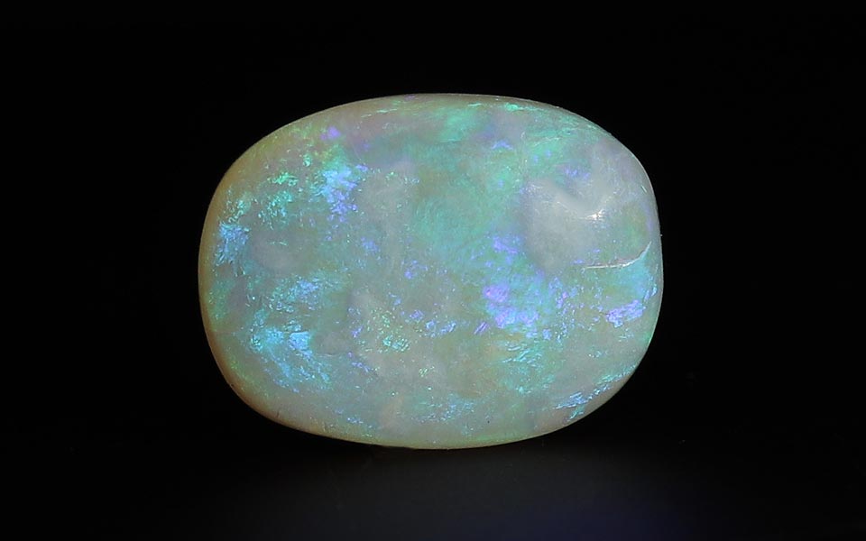 White Opal With Fire - 6.95 Carat