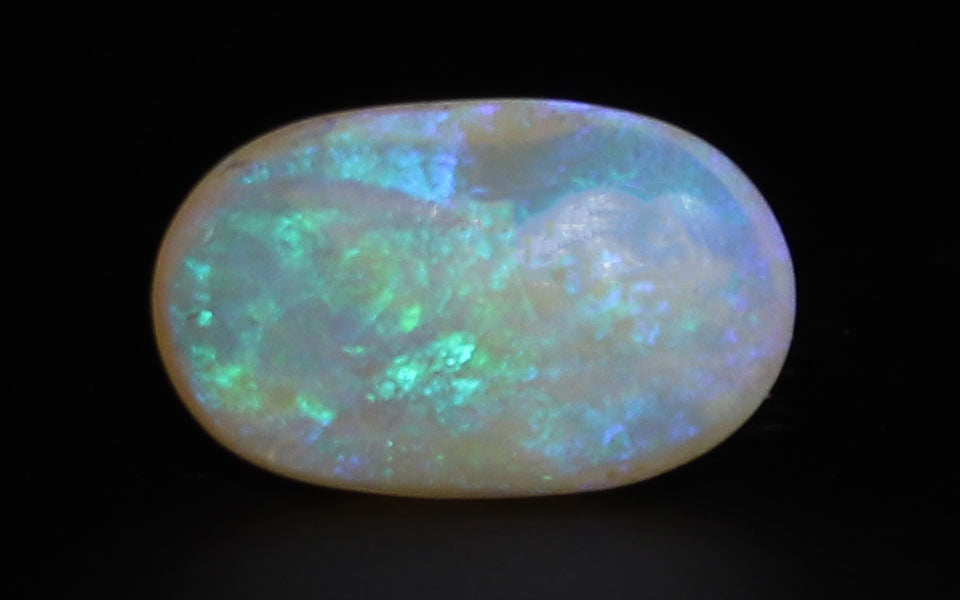 White Opal With Fire - 6.85 Carat