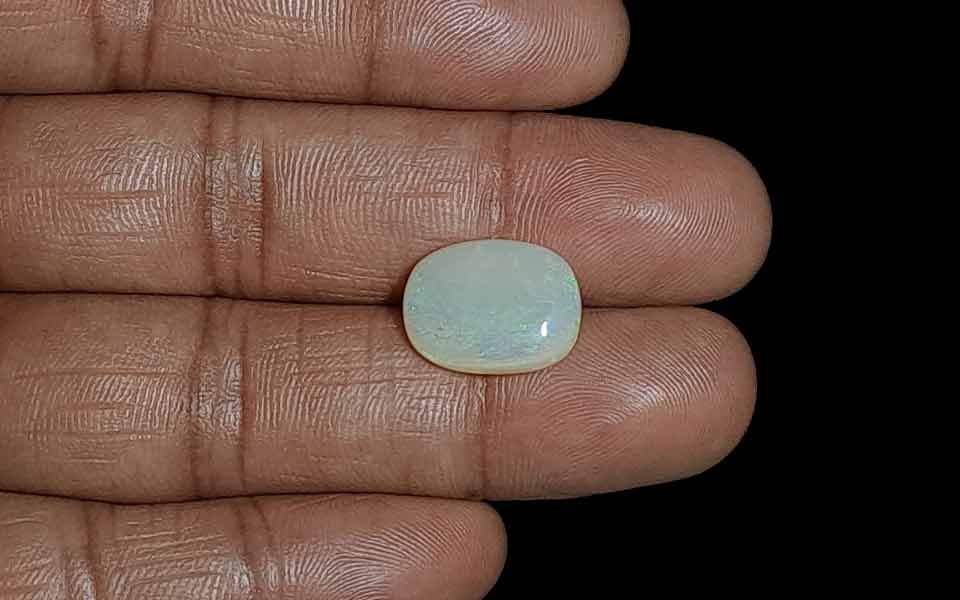 White Opal With Fire - 6.95 Carat