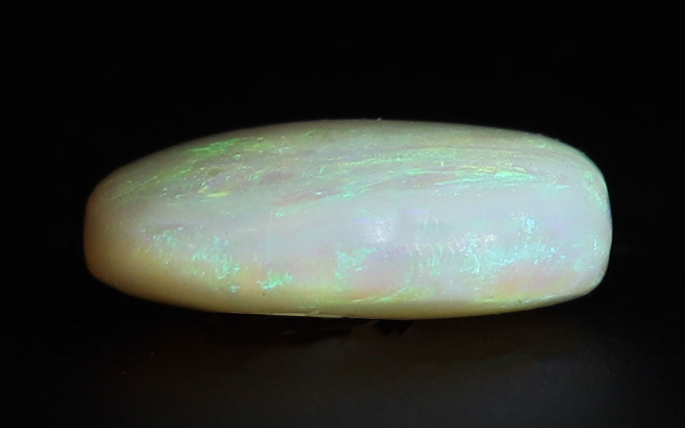 White Opal With Fire - 6.95 Carat