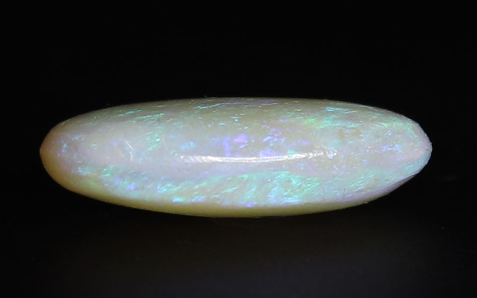 White Opal With Fire - 6.85 Carat
